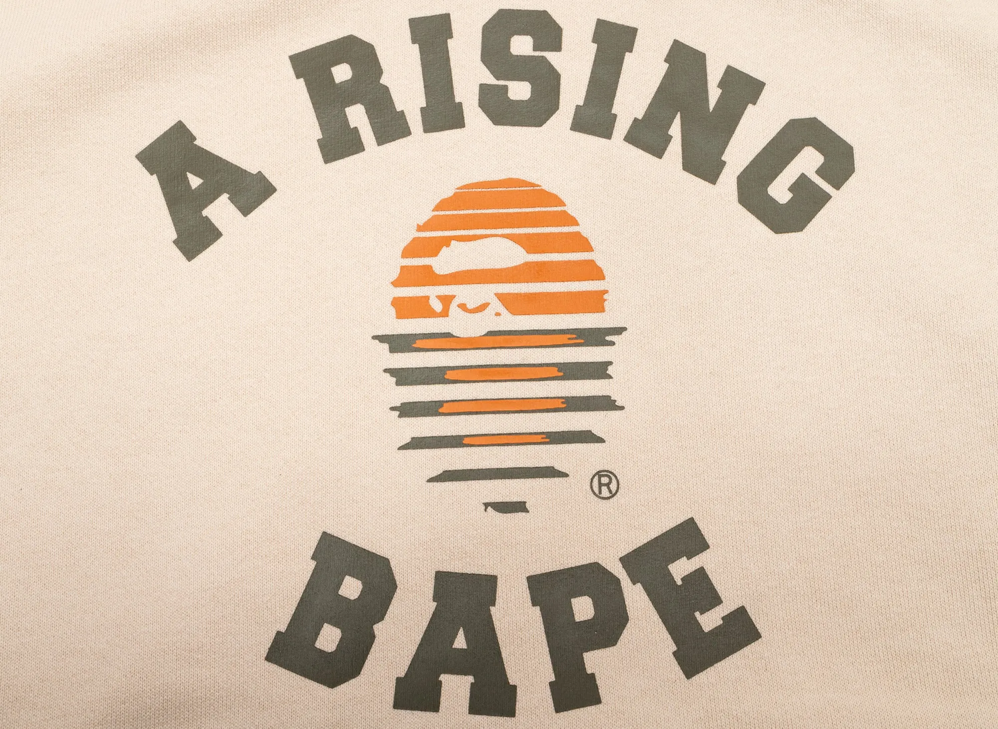 A Bathing Ape A Rising Bape Pullover Hoodie in Ivory