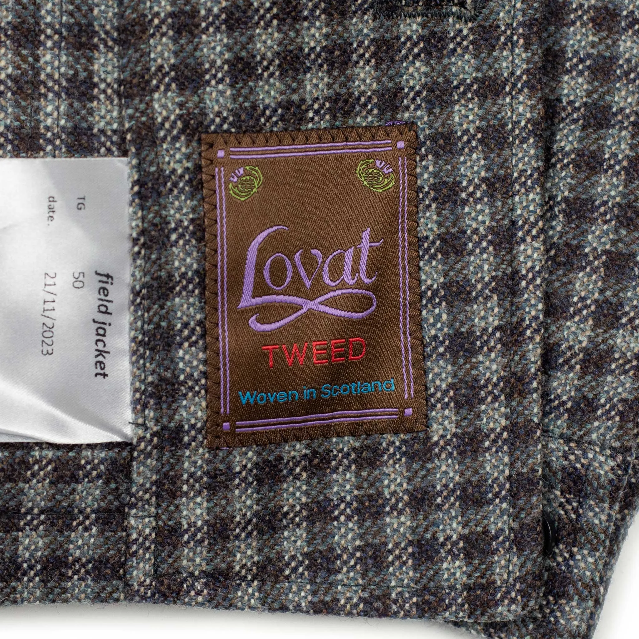 x Sartoria Carrara: field jacket in deadstock Lovat gunclub thistle tweed wool